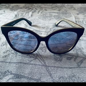 QUAY sunglasses.